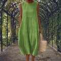 Amandine – Robe midi fluide sans manches avec poches